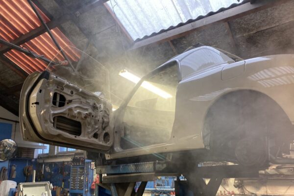 Nissan Figaro antirust wax treatment