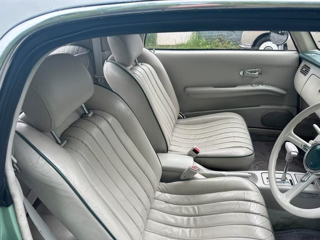 Nissan Figaro Emerald Green interior